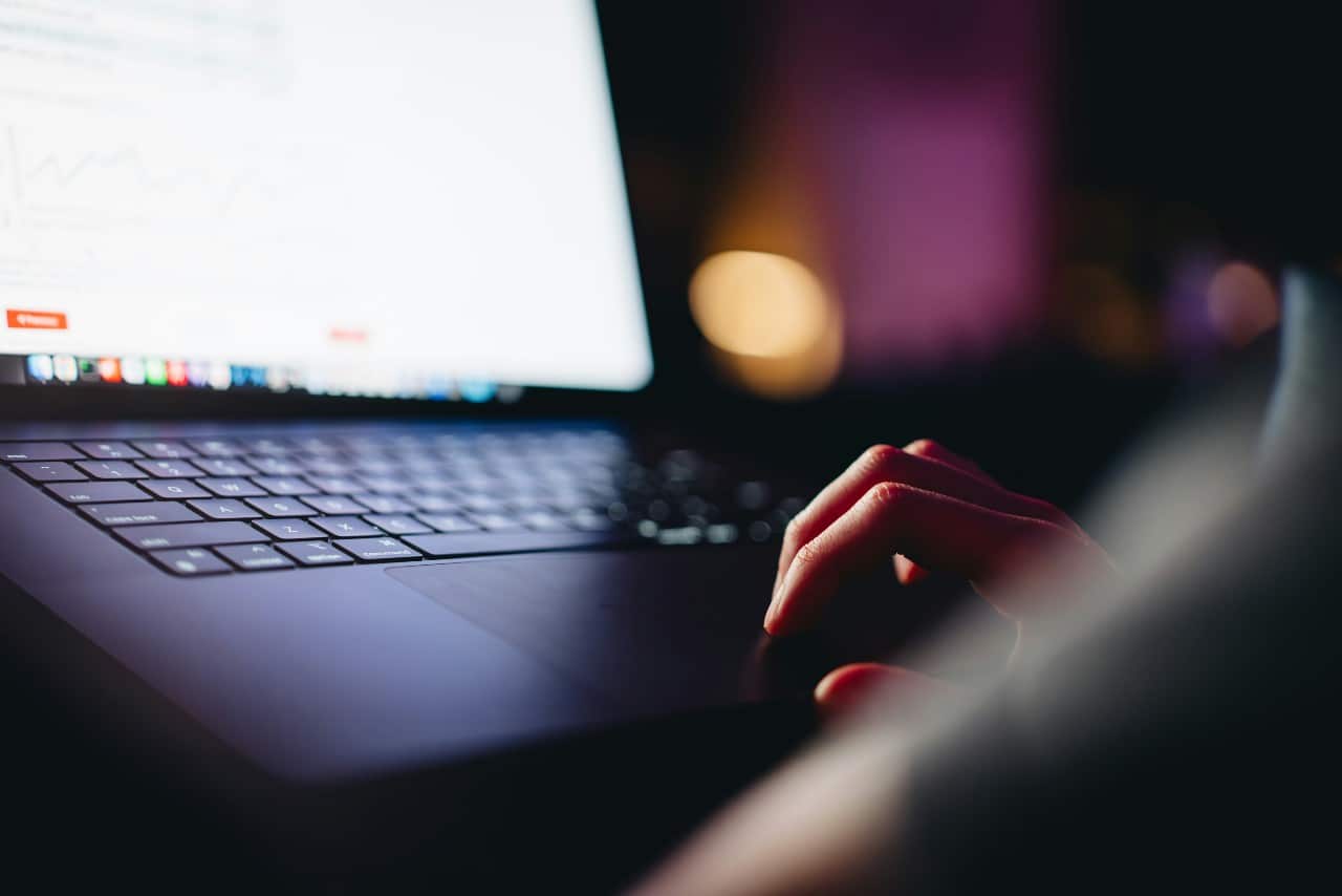 person typing at night person typing at night